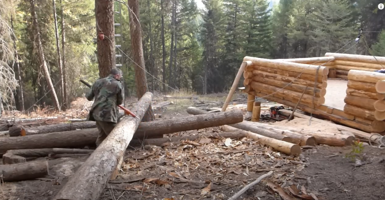 Moving cabin logs by hand